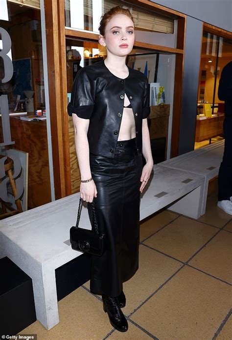 Sadie Sink flashes her bra in sleek black outfit at the Chanel Cruise